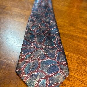 61. VTG Peacocks Men's Formal Necktie with a multi-color abstract pattern.